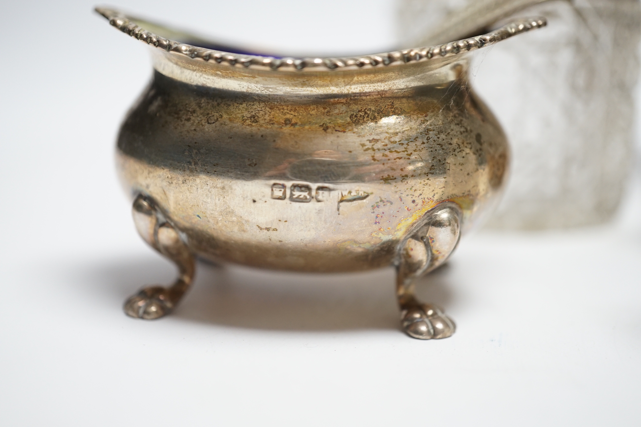 A plated cocktail shaker and sundry small silverwares including silver salt with Bristol blue glass liner, largest 23cm high